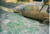 Nissan Hardbody - Bigdumanimal's muddy truc