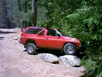 Nissan Pathfinder - on a rock
