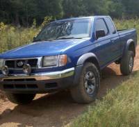 Nissan Frontier - stock w bald mud dawgs